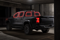 2023-2026 Chevrolet Colorado Crew Cab with front door, rear door, and rear cargo windows outlined in neon red showing precut tint kit coverage