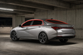 2021-2026 Hyundai Elantra with front door, rear door, and rear glass windows outlined in neon red showing precut tint kit coverage