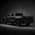 2019-2026 Chevrolet Silverado 1500 Crew Cab with front door, rear door, and back glass windows outlined in neon red showing precut tint kit coverage