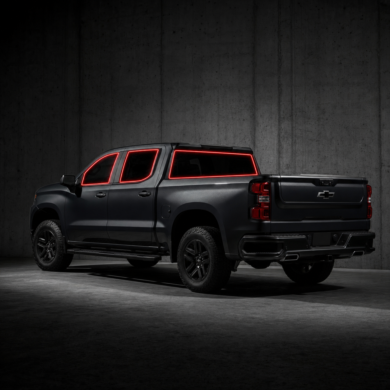 2019-2026 Chevrolet Silverado 1500 Crew Cab with front door, rear door, and back glass windows outlined in neon red showing precut tint kit coverage