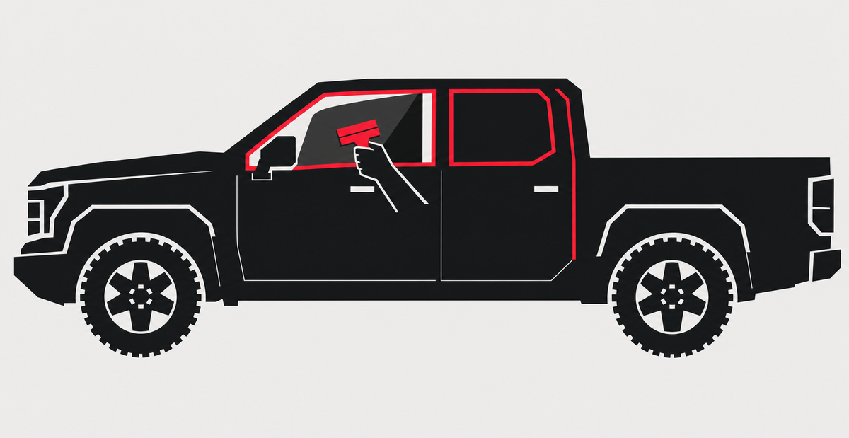 Window tint installation service - black pickup truck silhouette with red outlined windows and squeegee applying tint film
